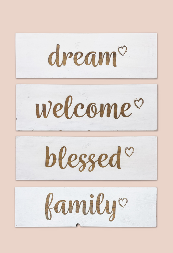 image of reclaimed signs with words: dream, welcome, blessed and family by Seeds to Sow